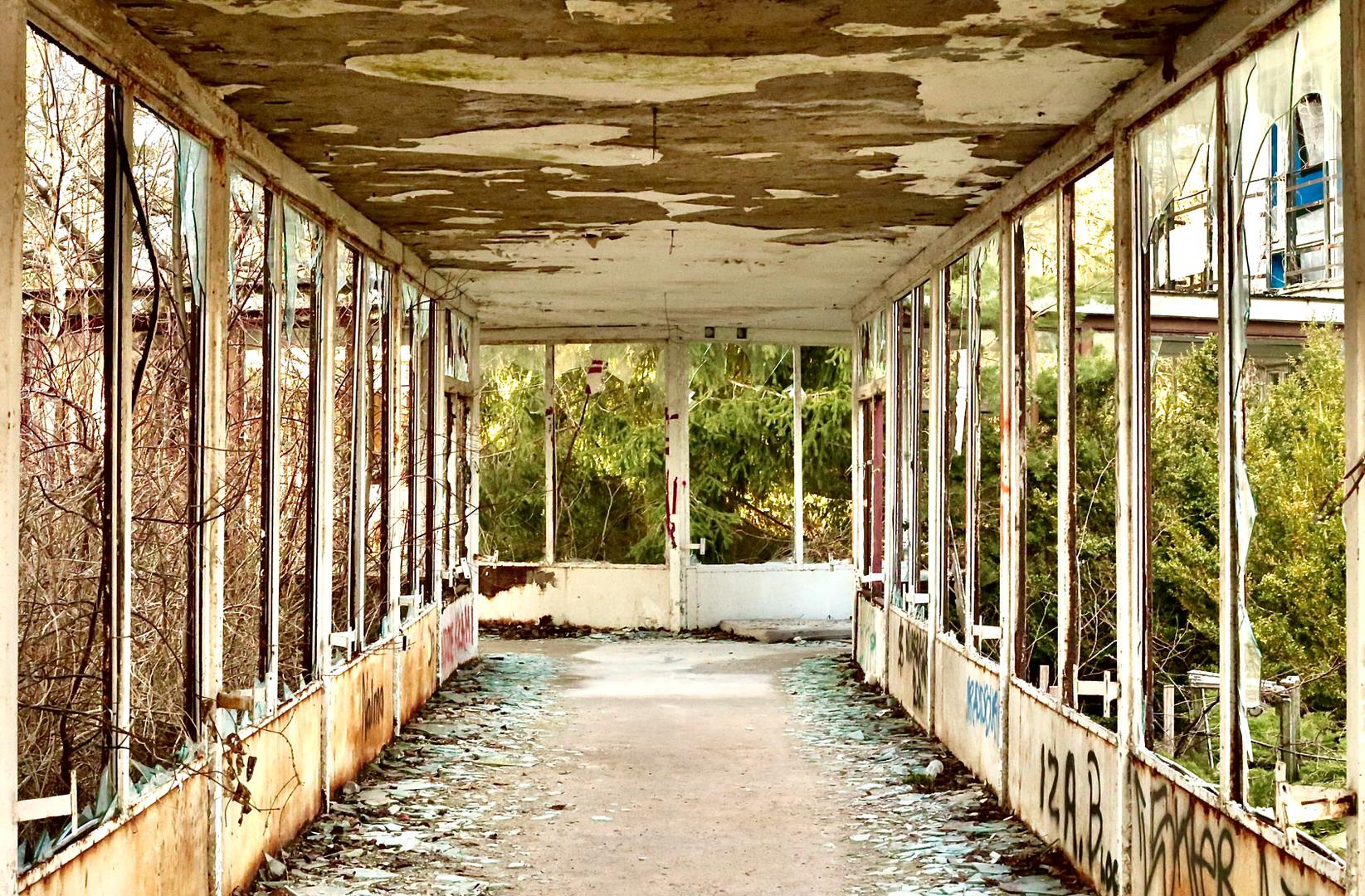 A corridor through an abandoned building